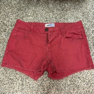 Red JOLT brand cutoff shorts